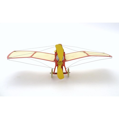 1473 - Toy: A 20thC German tinplate clockwork monoplane / aeroplane, Kranich 310. Made by Dusseldorfer Blec... 