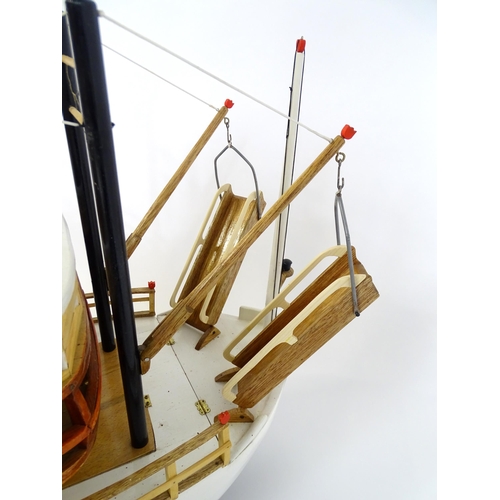 1491 - A 20thC scratch built scale model of a 19thC paddle steamer boat , ' Mississippi Swan' , of wooden c... 