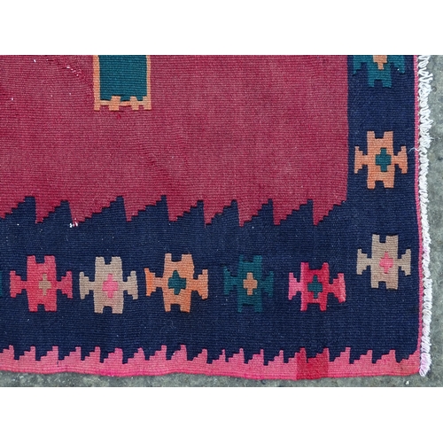 1508 - Carpet / Rug : A South West Persian Qashgai Kilim, the red ground with geometric repeated motifs.  A... 