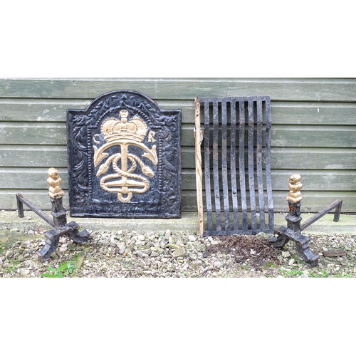 1368A - A cast iron fire back of arched form with relief decoration depicting CR crown, anchor and rope, wit... 