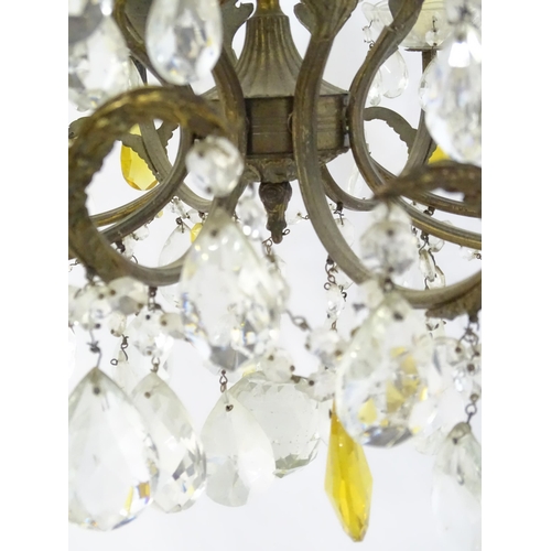 1556 - A late 19thC / early 20thC 8-branch chandelier / electrolier / pendant light with acanthus scroll de... 