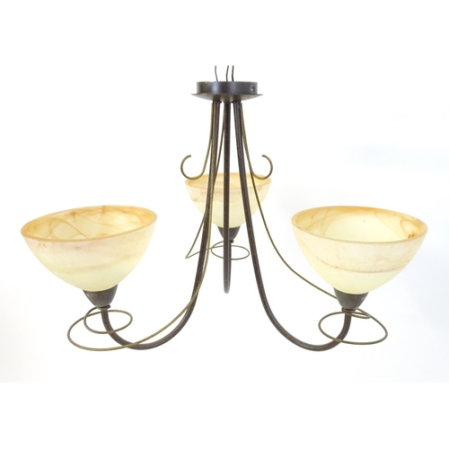 1558 - A pair of 3 branch lights with scroll detail and shades. Approx. 16 1/2