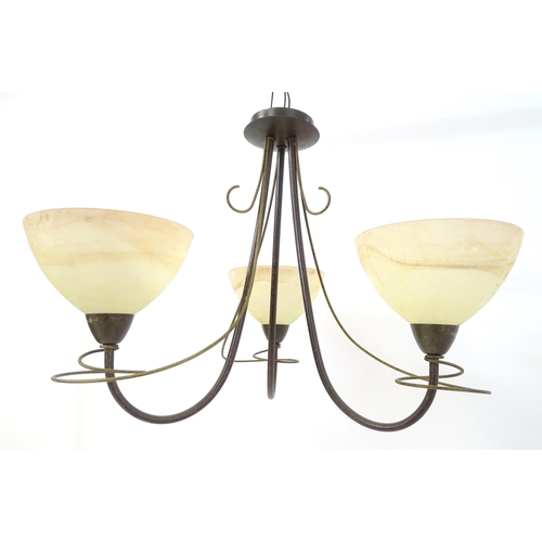 1558 - A pair of 3 branch lights with scroll detail and shades. Approx. 16 1/2