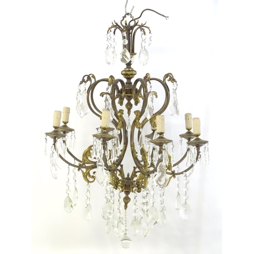 1563 - A late 19thC / early 20thC chandelier / electrolier / pendant light with 8 scrolling branches decora... 