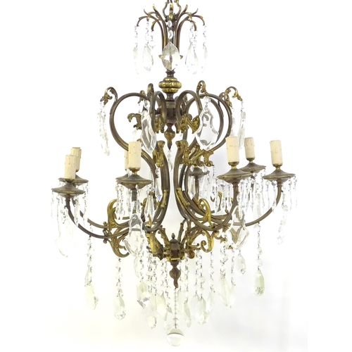 1563 - A late 19thC / early 20thC chandelier / electrolier / pendant light with 8 scrolling branches decora... 