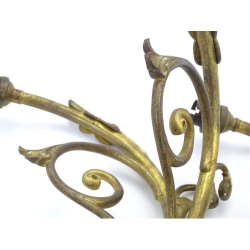 1585 - A pair of Arts & Crafts style brass double wall lights, each branch protruding approx 12