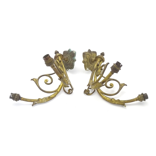 1585 - A pair of Arts & Crafts style brass double wall lights, each branch protruding approx 12