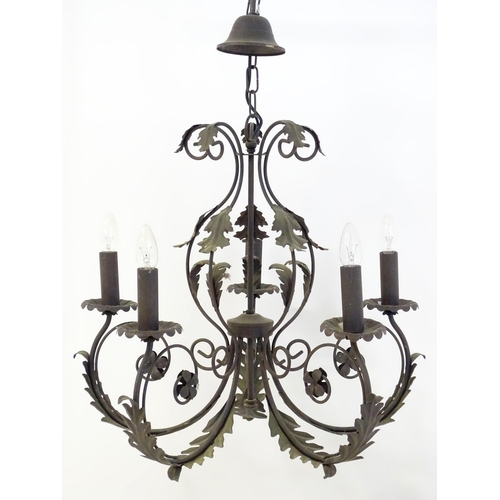 1588 - A 20thC 5-branch chandelier / electrolier / pendant light with acanthus scroll detail. Approx 23