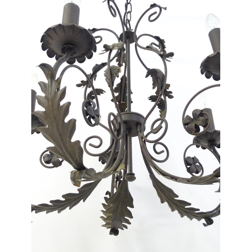 1588 - A 20thC 5-branch chandelier / electrolier / pendant light with acanthus scroll detail. Approx 23