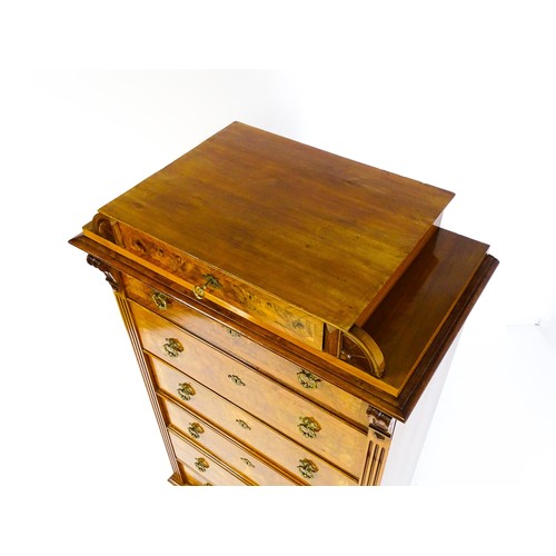 1593 - A late 19thC / early 20thC burr walnut tall boy / chest of drawers, the chest having an upper tier w... 