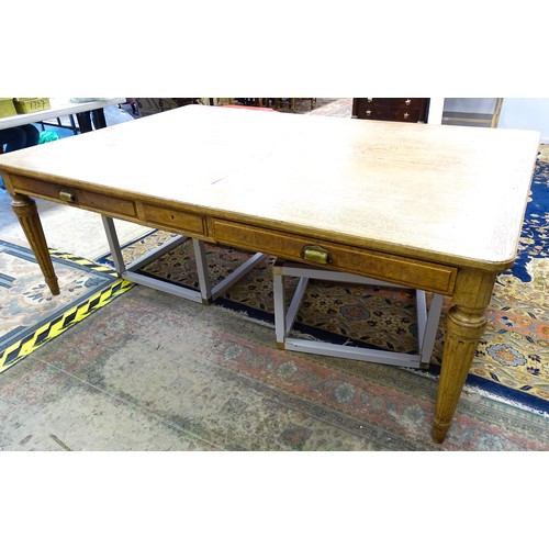 1599 - An exceptionally large, mid / late 20thC oak dining table / farmhouse kitchen table, with three frie... 