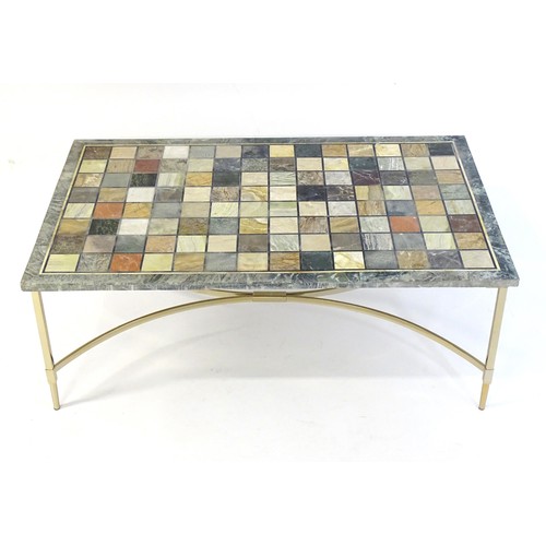 1617 - A 20thC marble topped coffee table, the specimen marble top of rectangular form resting on a chromed... 