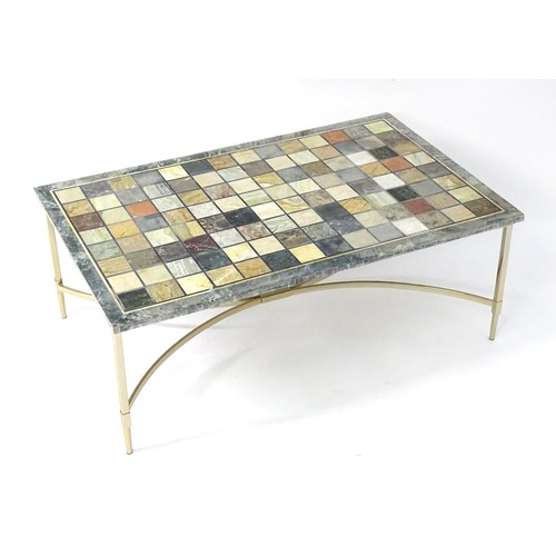 1617 - A 20thC marble topped coffee table, the specimen marble top of rectangular form resting on a chromed... 