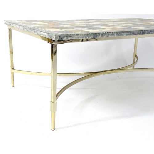 1617 - A 20thC marble topped coffee table, the specimen marble top of rectangular form resting on a chromed... 