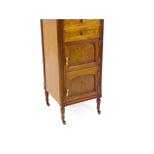 1636 - A late 19thC French kingwood cabinet, with a marble top above two short drawers and two panelled cup... 