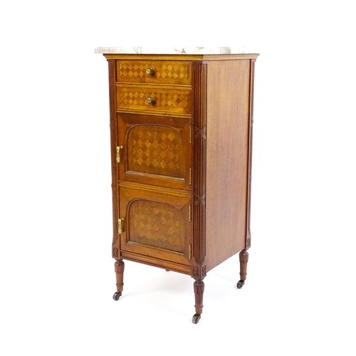 1636 - A late 19thC French kingwood cabinet, with a marble top above two short drawers and two panelled cup... 