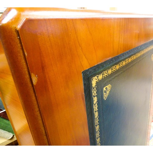 1661 - A yew wood veneered double pedestal writing desk with a gold tooled inset leather top, the base comp... 