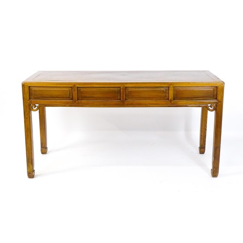 1685 - An early 20thC oriental elm sideboard, with four short drawers to the frieze and carved scrolls tot ... 