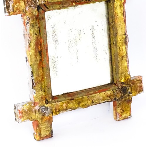 1695 - A19thC mirror with carved roundels and a gilded finish. 22