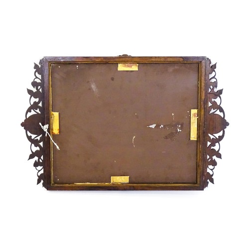 1699 - A 19thC carved rosewood mirror, with floral mouldings and a fretwork carved surround. 22