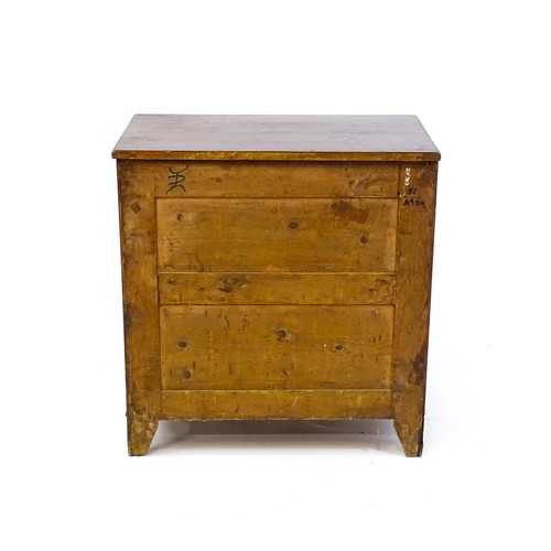 1702 - A late Georgian mahogany chest of drawers with a reeded top above four long graduated drawers with b... 