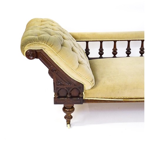 1717 - A late 19thC chaise longue with a turned gallery to the back supporting the arm, Greek key incising ... 