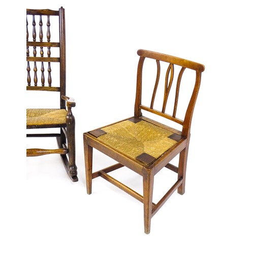 1727 - Two 19thC rush seated chairs, one a spindle back rocking chair, together with a side chair raised on... 