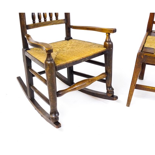 1727 - Two 19thC rush seated chairs, one a spindle back rocking chair, together with a side chair raised on... 