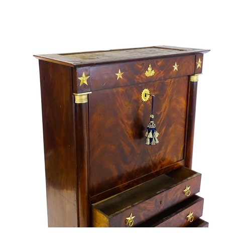 1731 - A 19thC continental mahogany secretaire, with a fall front above three long drawers, the structure a... 