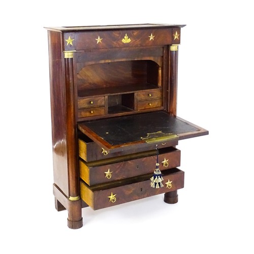 1731 - A 19thC continental mahogany secretaire, with a fall front above three long drawers, the structure a... 