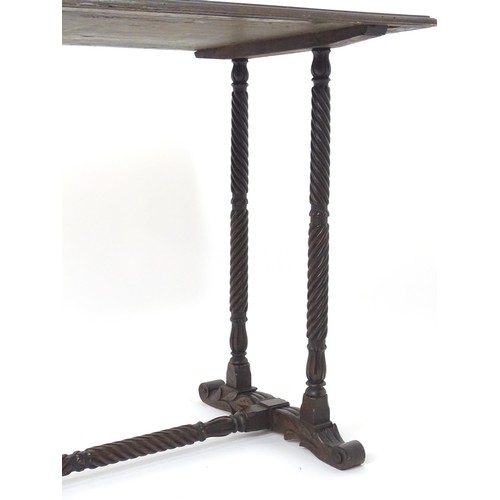 1746 - A 19thC mahogany table with a moulded rectangular table top above four spiral turned  legs and a mat... 