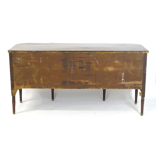 1752 - An early / mid 19thC mahogany Gothic sideboard, having a D-shaped top above lancet mouldings and rin... 