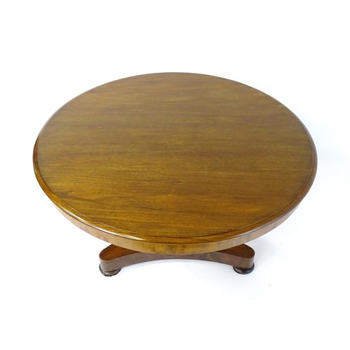 1766 - A mid 19thC mahogany breakfast / dining table, the top of circular form and having a moulded edge ab... 