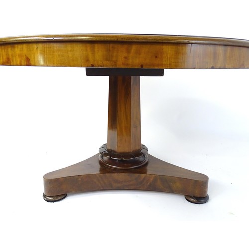 1766 - A mid 19thC mahogany breakfast / dining table, the top of circular form and having a moulded edge ab... 