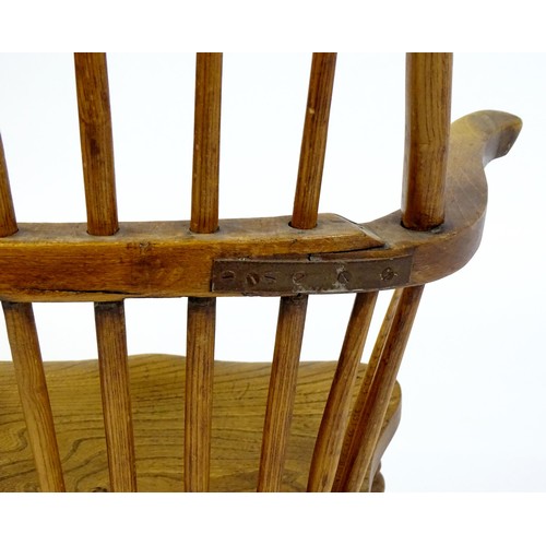 1767 - An early / mid 19thC Windsor chair of ash, elm and beech construction, having a double bow back, swe... 