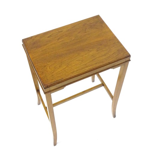 1771 - An early / mid 20thC oak side table with a rectangular top above applied mouldings to the apron and ... 