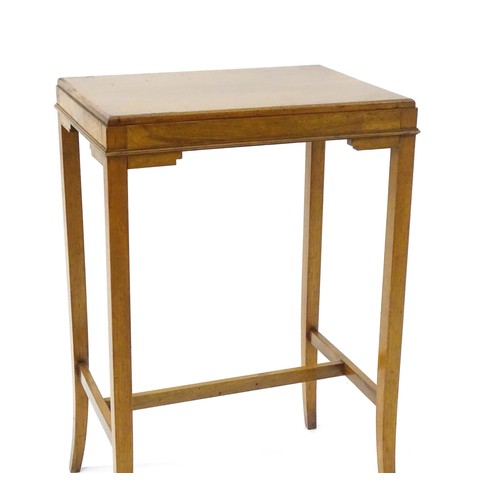 1771 - An early / mid 20thC oak side table with a rectangular top above applied mouldings to the apron and ... 