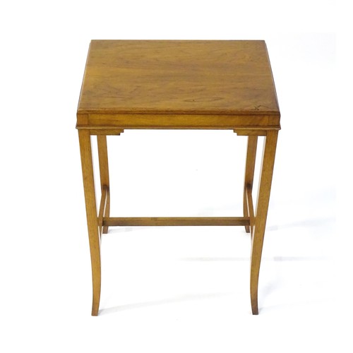 1771 - An early / mid 20thC oak side table with a rectangular top above applied mouldings to the apron and ... 