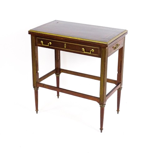 1780 - A 19thC mahogany card table with gilt brass mounts, brass inlay and a hinged, folding top, the top r... 