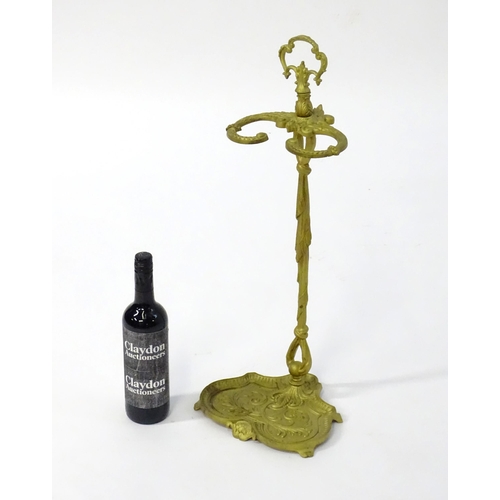 1783 - A late 20thC cast metal stick stand of small proportions, with a pierced handle and drip tray to the... 