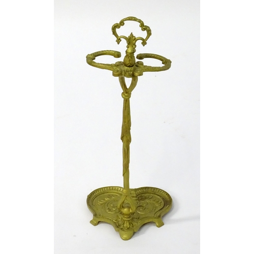 1783 - A late 20thC cast metal stick stand of small proportions, with a pierced handle and drip tray to the... 