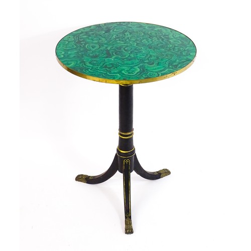 1786 - A Regency style tripod table with a circular top above an ebonised gilt highlighted base with three ... 