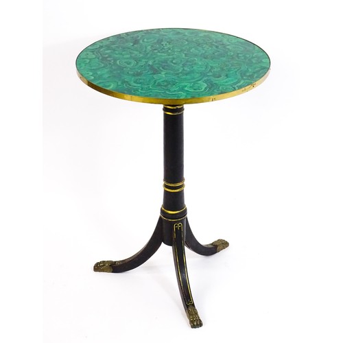 1786 - A Regency style tripod table with a circular top above an ebonised gilt highlighted base with three ... 