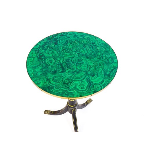 1786 - A Regency style tripod table with a circular top above an ebonised gilt highlighted base with three ... 