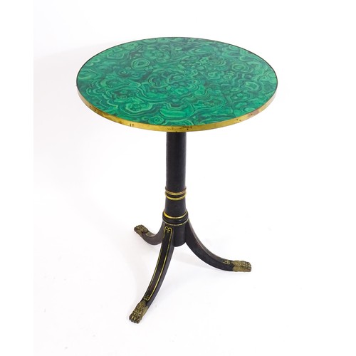 1786 - A Regency style tripod table with a circular top above an ebonised gilt highlighted base with three ... 