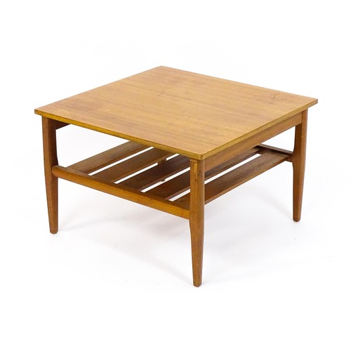 1790 - Vintage / Retro: A late 20thC teak 'Myer' coffee table with a squared top and slatted under tier rai... 