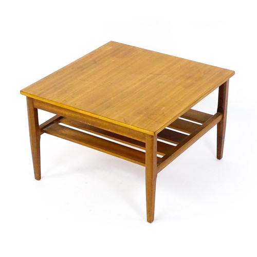 1790 - Vintage / Retro: A late 20thC teak 'Myer' coffee table with a squared top and slatted under tier rai... 