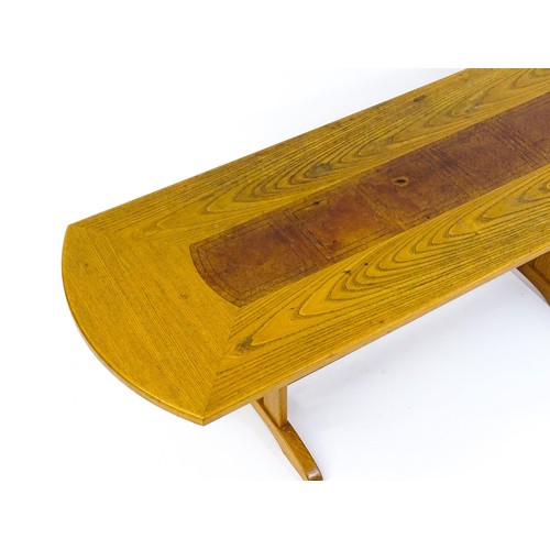 1791 - Vintage / Retro: An oak G-Plan coffee table with an inset leather top raised on rectangular supports... 