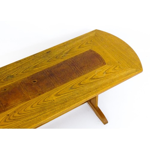 1791 - Vintage / Retro: An oak G-Plan coffee table with an inset leather top raised on rectangular supports... 