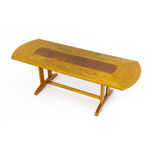 1791 - Vintage / Retro: An oak G-Plan coffee table with an inset leather top raised on rectangular supports... 